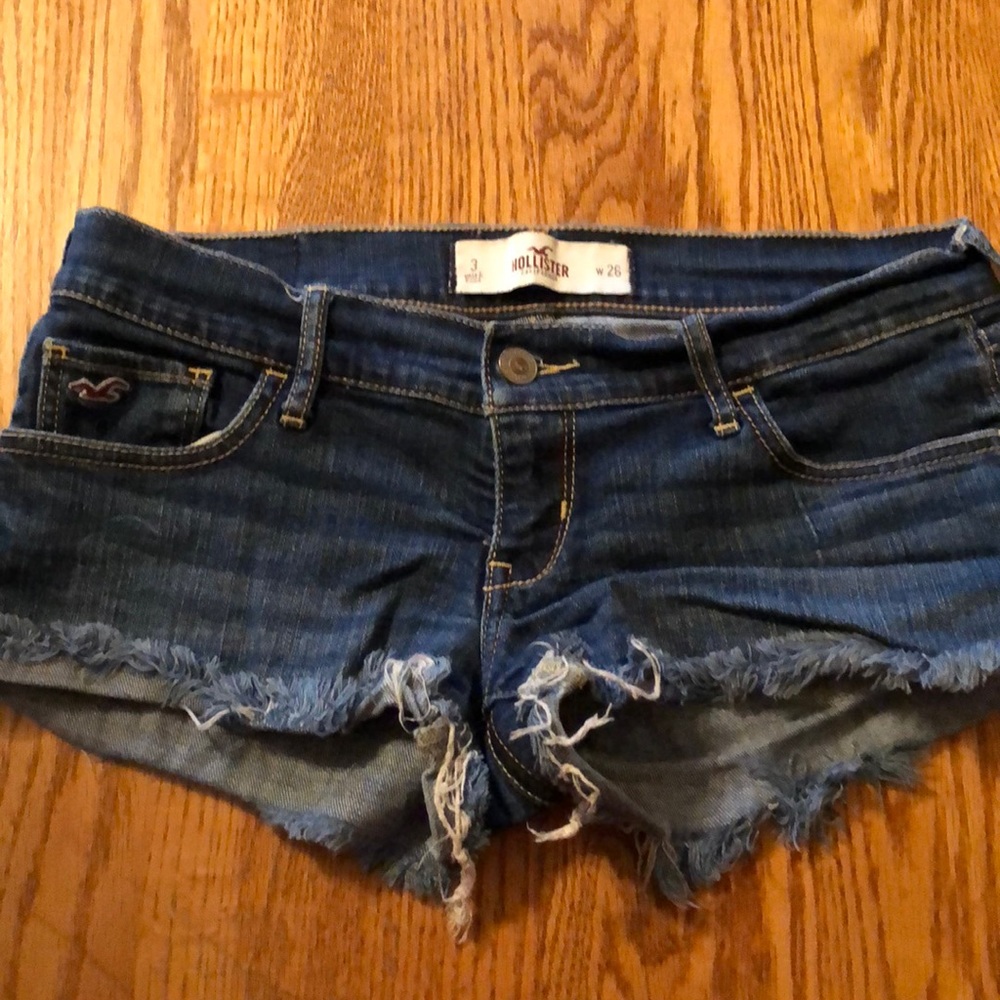 Hollister medium wash fringe shorts